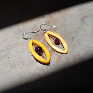 Yellow oval shell with Komen stone earrings