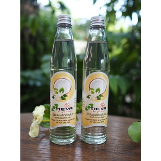 น้ำมันมะพร้าวกลิ่นโมก ขนาด 85 มล. แบรนด์ชีวาบายพลชา (Cheva By Phalacha Coconut Oil with Wild Water Plum 85 ml.)