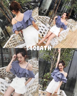 เสื้อสายเดี่ยว 1 ข้าง อีกข้างเป็นระบาย 2 ชั้น ช่วงเอวแต่งตาไก่ ร้อยสายรูดเข้ารูปได้เลย