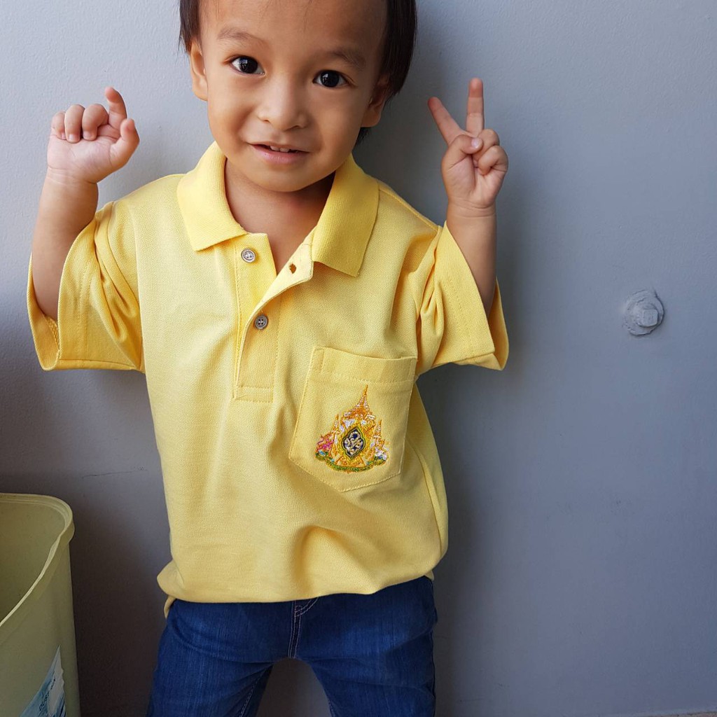 เสื้อโปโลสีเหลืองเด็ก ปักตรา มีกระเป๋า