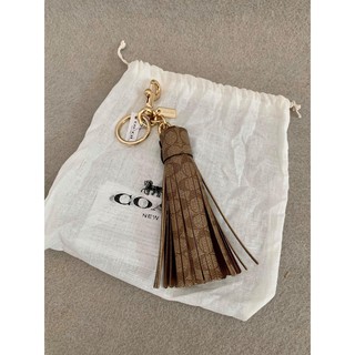 (ส่งฟรี) COACH TASSEL BAG CHARM IN SIGNATURE CANVAS พวงกุญแจ