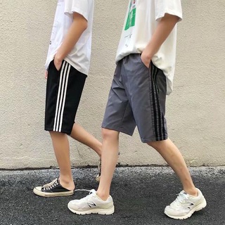 【🔥M-XXL พร้อมส่ง🔥】กางเกงขาสั้นผ้ายืด ทรงหลวม กางเกงขาสั้นลายทางสไตล์เกาหลี กางเกงขาสั้นเอวยางยืด ผ้าน้ำหนักเบา แฟชั่นฤดูร้อน กางเกงวิ่งขาสั้นผู้ชาย