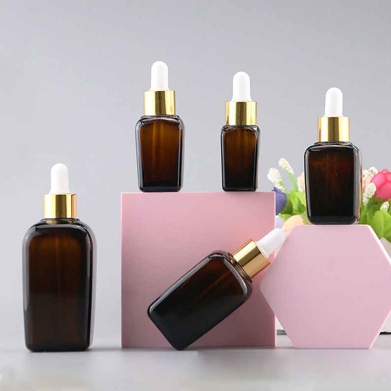 ขวดบรรจุภัณฑ์เครื่องสำอางสำหรับบรรจุ 20ml  ขวดแก้วดรอปเปอร์สีชาสำหรับบรรจุเซรั่มใส่สารสกัดของเหลว cosmetics packaging glass bottle