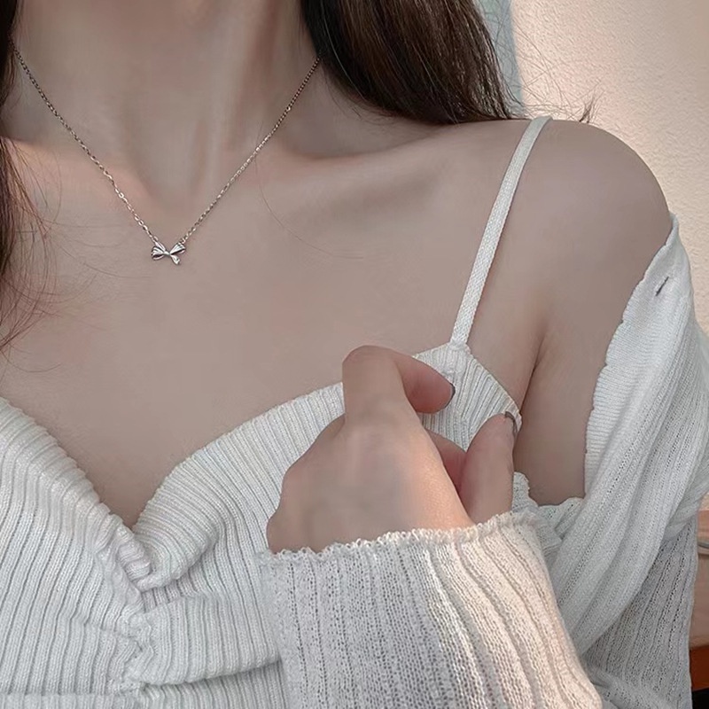 Cocojewelry สร้อยคอโซ่เงิน 925 จี้โบว์ ลายคลื่นน้ํา เรียบง่าย