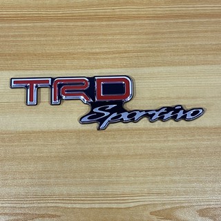 โลโก้*คำว่า TRD sportivo งานเคลือบแก้ว ( ขนาด* 4.8 x 17 cm ) ราคาต่อชิ้น