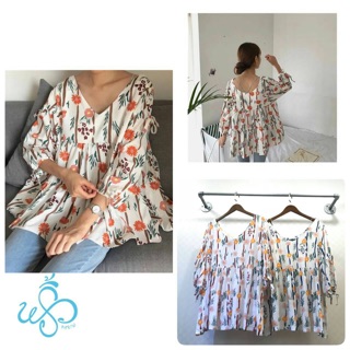เสื้อลายดอกทรงระบาย