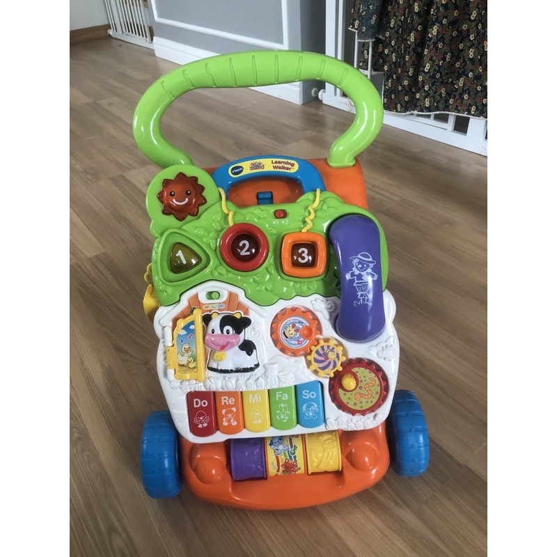 รถเข็นหัดเดิน  vtech sit to stand walker