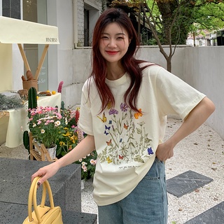 Suxi เสื้อยืดลําลอง ผ้าฝ้าย แขนสั้น คอกลม พิมพ์ลายดอกไม้ ทรงหลวม แบบเรียบง่าย แฟชั่นฤดูร้อน สไตล์เกาหลี สําหรับสตรี