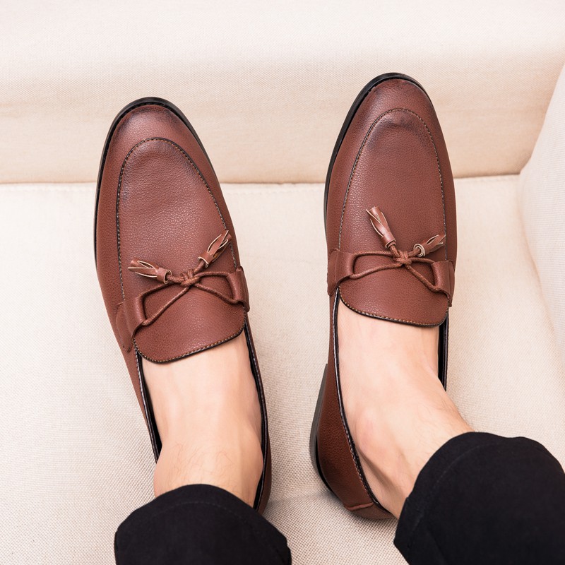 brown leather business shoes