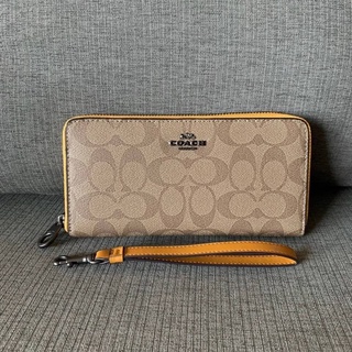 COACH (C4452) LONG ZIP AROUND WALLET IN SIGNATURE CANVAS