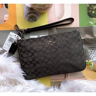 เป๋าถือcoach สีดำ เทา ผ้าทอ (งานshop)  Coach 86098 Signature Small Wristlet