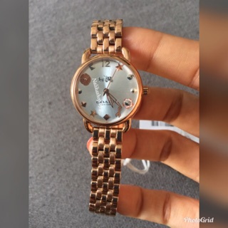 Coach rose gold 31 mm.