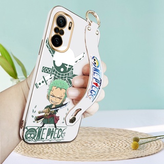 (พร้อมสายรัดข้อมือ) สำหรับ  Xiaomi Redmi K40 Pro Plus K40S K20 Pro K40 Gaming K50 Gaming เคสนิ่ม การ์ตูน (One Piece) รูปแบบ Zoro ปกอ่อน Square EDGE ปลอกหรูหราชุบ TPU เคสโทรศัพท์