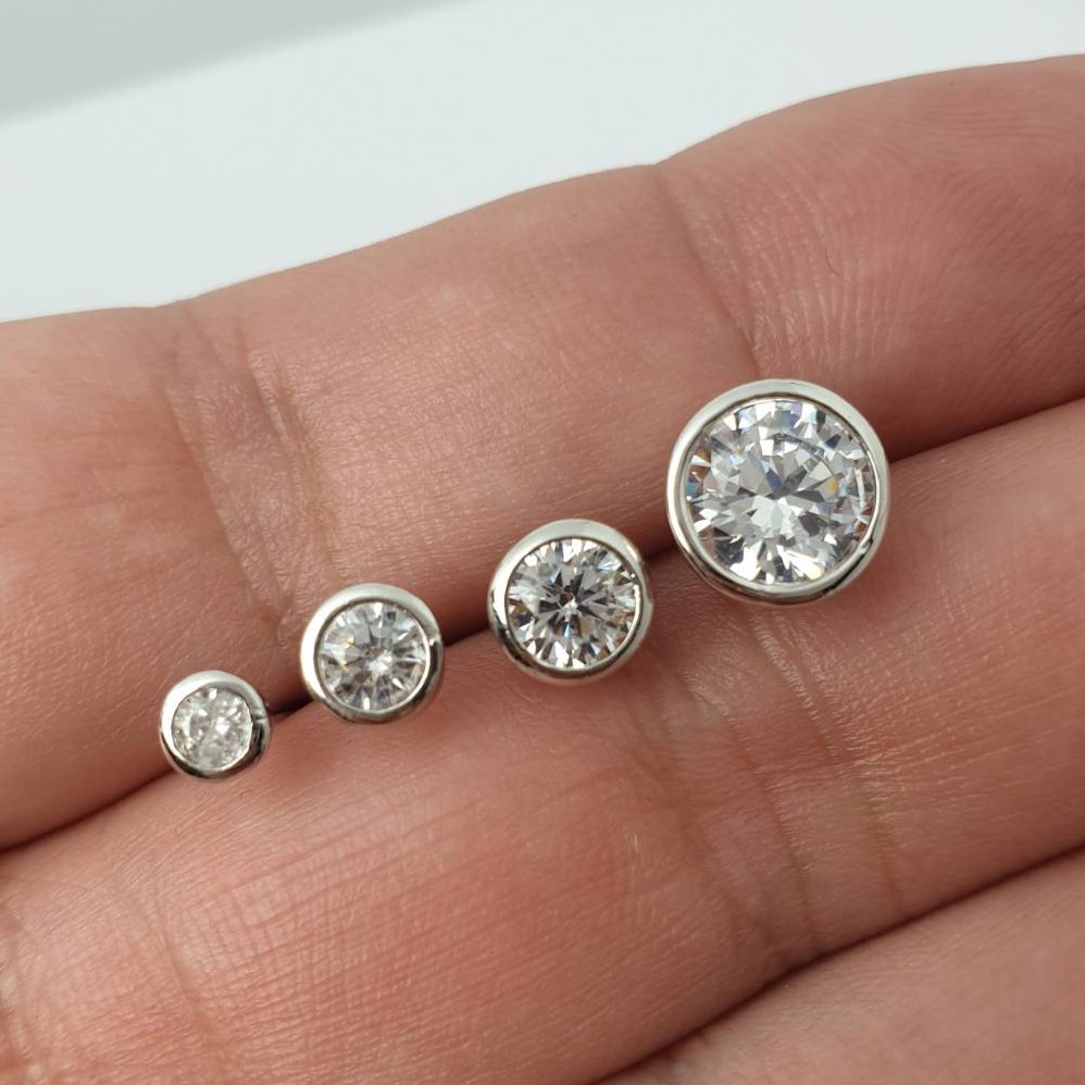 AC_Jewelry ต่างหูล้อมเพชร CZ Diamond 3,4,5,6,7 mm. ตัวเรือนเงินโรเดียมไม่แพ้ ไม่ลอกไม่ดำ