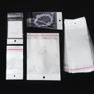 100 ชิ้นโปร่งใสซีลกาวตนเองถุงเก็บพลาสติก OPP Pack กระเป๋าแขวนหลุมถุงบรรจุภัณฑ์ขายปลีก