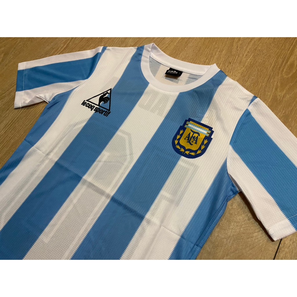 เสื้อทีมอาเจนติน่าเหย้า 1986 ย้อนยุค เพลเยอร์ (แถมเบอร์10 MARADONA )