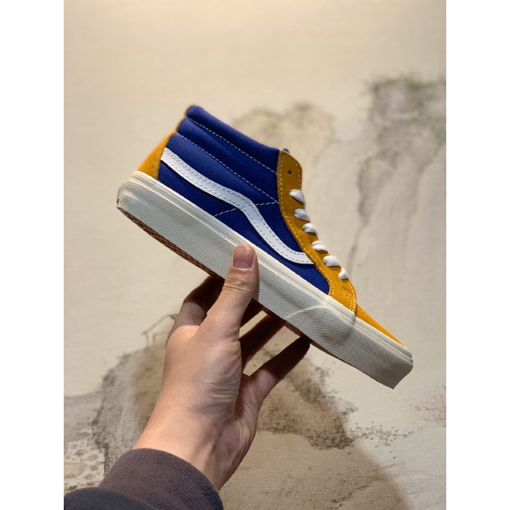 royal blue and yellow vans