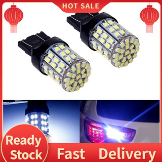 【พร้อมส่ง】หลอดไฟเบรกท้ายรถยนต์ Led 12V T20 7440 7443 64 SMD 6000K สีขาว 2 ชิ้น