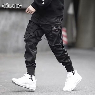 OKADY เลกกิ้งหลวมสบาย ๆ ของผู้ชายหลายกระเป๋า