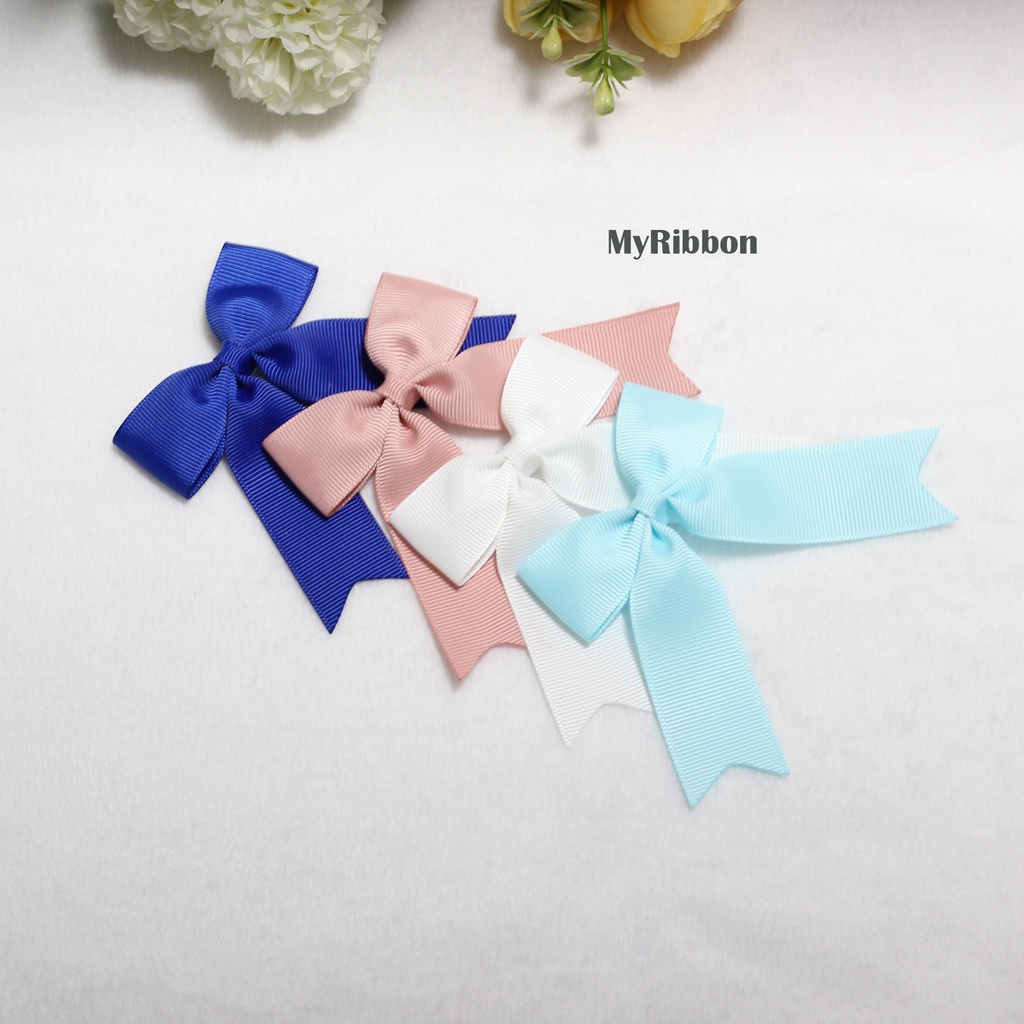โบติดผมนักเรียน/กิ๊บติดผมเด็ก งานแฮนด์เมด ราคาคู่ละ 35 บาท แบบที่ 1