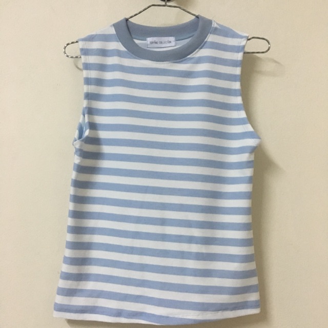 เสื้อแขนกุด Topping Collection