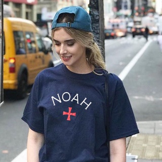 เสื้อยืดแขนสั้น ผ้าฝ้าย พิมพ์ลายกราฟฟิค NOAH แฟชั่นคู่รัก สไตล์เกาหลี สําหรับผู้หญิง และผู้ชาย