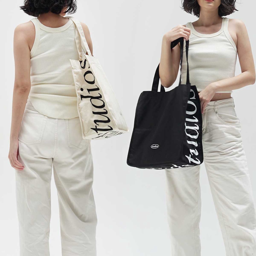 HOMELAND - กระเป๋าสะพาย tote ผ้า canvas สกรีนลายรอบใบ สีครีม / สีดำ