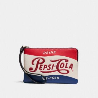 Coach  corner zip wristlet with pepsi