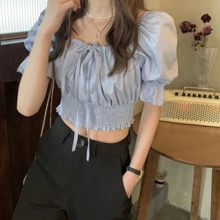 มาใหม่เสื้อครอปเอวลอยเเขนตุ๊กตาผูกโบว์ สีพื้นผ้าลื่น งานสม็อคเอว มี3สีไห้เลือก