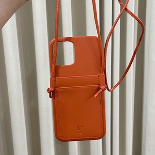 USED the local collective crossbody case in papaya 👉 iPhone 12/12pro