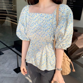 เสื้อคอยูลายดอกเดซี่