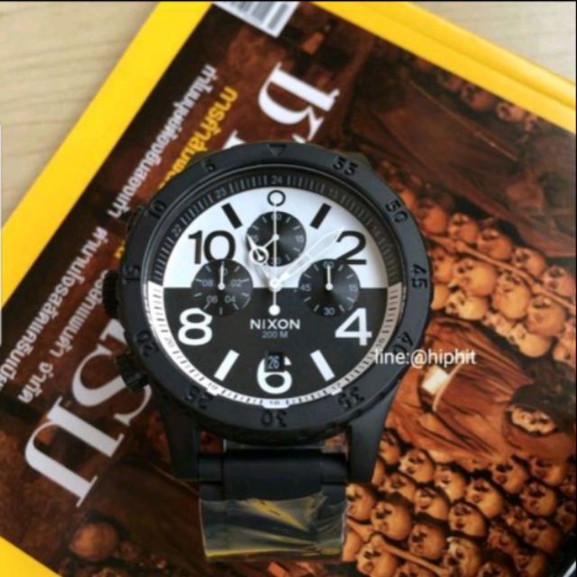 Nixon chronograph size 48 mm.