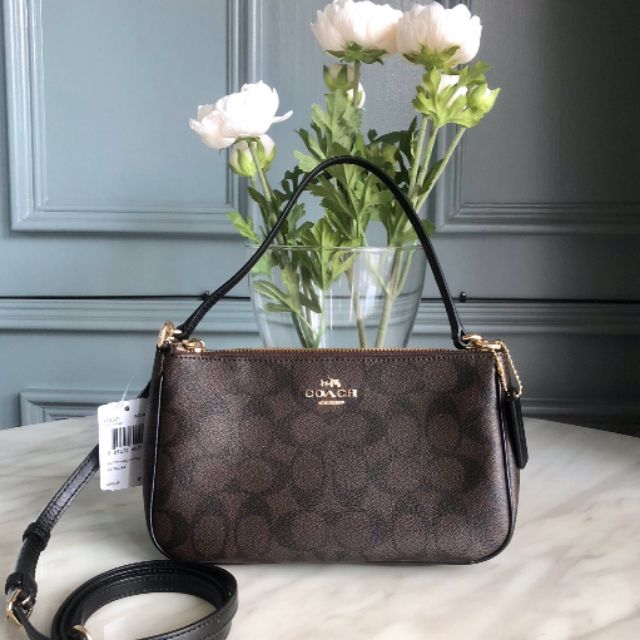 Coach #F58321 pouch crossbody .