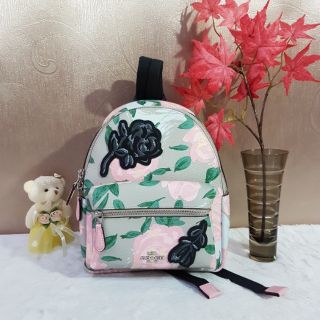 COACH F25869 MINI CHARLIE BACKPACK WITH CAMO ROSE FLORAL PRINT
COLOR: SILVER/BLUSH MULTI