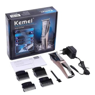 KEMEI รุ่น KM-5018 บัตตาเลี่ยนตัดผมไร้สาย เบาแบตตาเลี่ยน ปัตตาเลี่ยนตัดผมไฟฟ้าไร้สาย พร้อมที่รองหวี4ชิ้น ตัดแต่งทรงผม