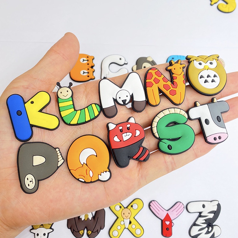 จระเข้ DIY น่ารักที่สร้างสรรค์#jibbitz Animal Pins Crocs Shoe Charms Letter AZ การ์ตูน ดอกไม้ rainbow 1-12 อุปกรณ์ตกแต่ง สําหรับรองเท้าและกระเป๋า