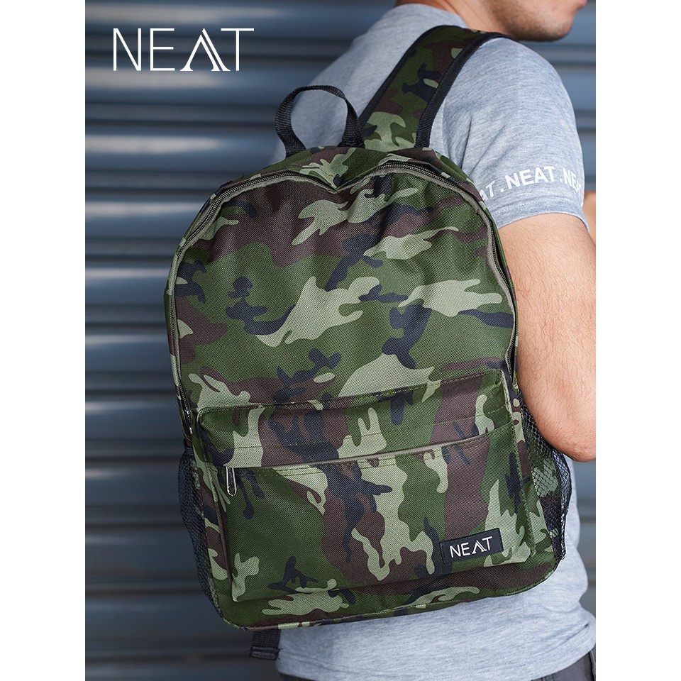 กระเป๋าเป้ผู้ชาย NEAT กระเป๋าสะพายหลังลายพราง กระเป๋าแฟชั่น NEAT Camo Backpack
