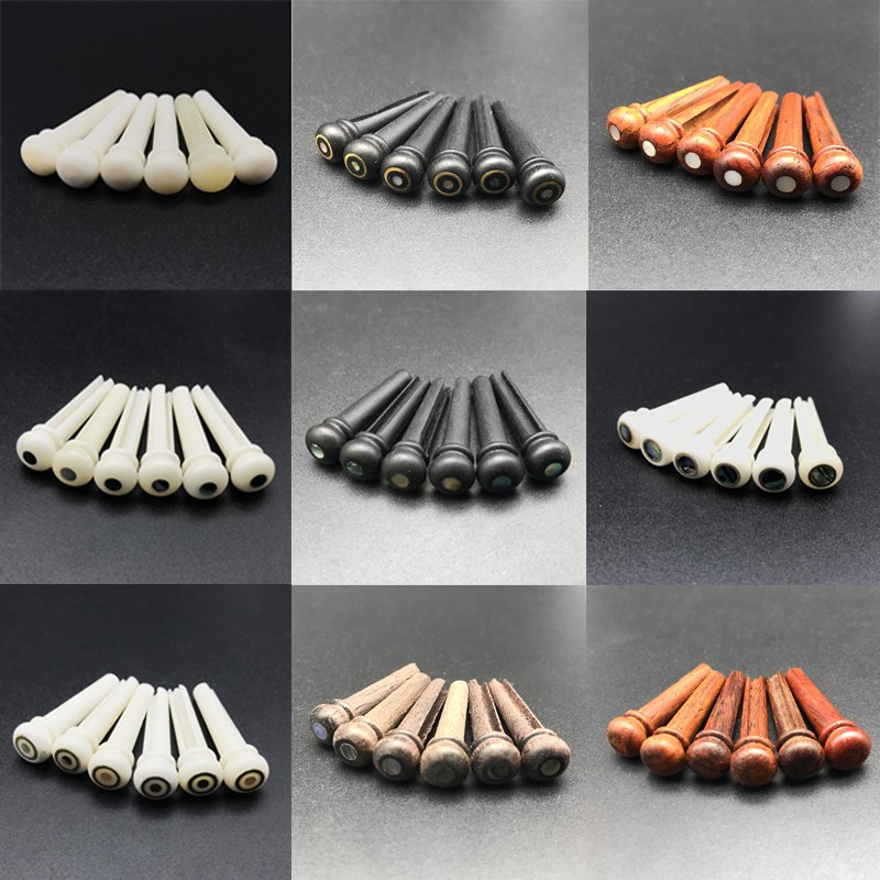 6 ชิ้นกระดูกจริงไม้มะเกลือ Rosewood กีตาร์อะคูสติกสะพาน Pins Pure Bone Bridge Pin สําหรับกีตาร์พื้นบ้านอะไหล่ทดแทน