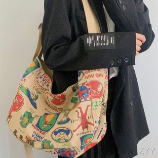 กระเป๋าสะพายข้างสไตล์ญี่ปุ่น Graffiti Casual Dumpling Bag in American retro canvas messenger bag