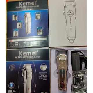 แบตตาเลียน KEMEI-1997 เเบตชาจ ไรสาย ตัดได้ดีมาก มีหัวรองเปลี่ยน4เบอร์ น้ำมัน หวีปัดเศษผม. Km-1997