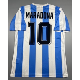 เสื้อบอล ย้อนยุค ทีมชาติ อาเจนติน่า 1986 เหย้า Retro Argentina Home พร้อมเบอร์ชื่อ 10 MARADONA แชมป์บอลโลก World Cup Cha