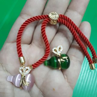 ข้อมือน้ำเต้า มีสีชมพู สีเขียว แจ้งสีที่แชท