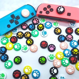 Jcd ฝาครอบปุ่มกดนิ้วโป้ง ซิลิโคน ลายกรงเล็บแมว สําหรับ switch OLED switch switch lite Joy Con Analog Stick Cap Skin JoyCon JoyCon Grip 2 ชิ้น