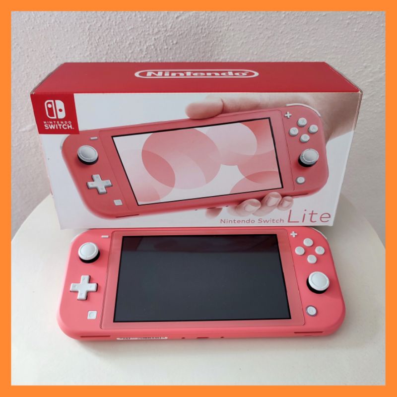 Nintendo Switch Lite Coral สีชมพู สินค้ามือสอง มีประกันเหลือ สภาพเหมือนใหม่