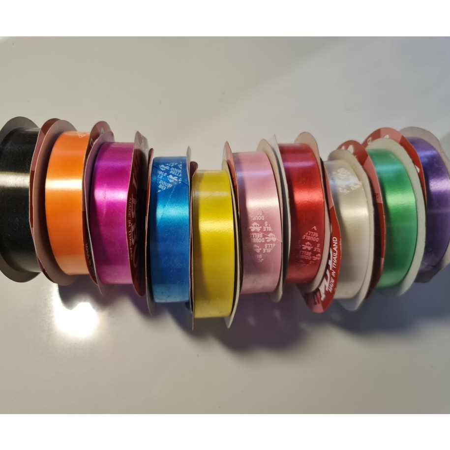 ริบบิ้น NO.5 ขนาด 21 มิล x 40 เมตร DOUBLE BELLS PLASTIC RIBBON  1 ม้วน