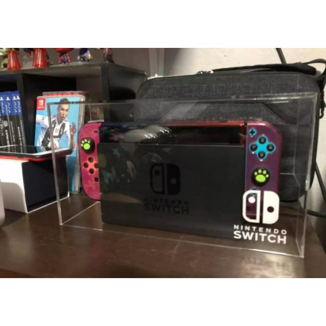 กล่องอะคริลิคใส ครอบเครื่อง NintendoSwitch เจาะรูด้านหลัง งานผลิตในไทย ไม่ใช่พลาสติกฉีด มียิงเลเซอร์โลโก้ด้านหน้า