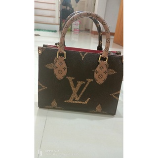 Louis Vuitton monogram on the go pm used bag like new