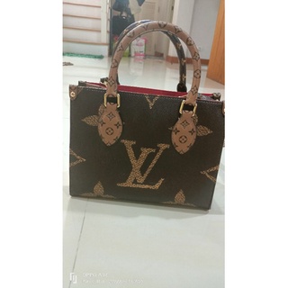 Louis Vuitton monogram on the go pm used bag like new