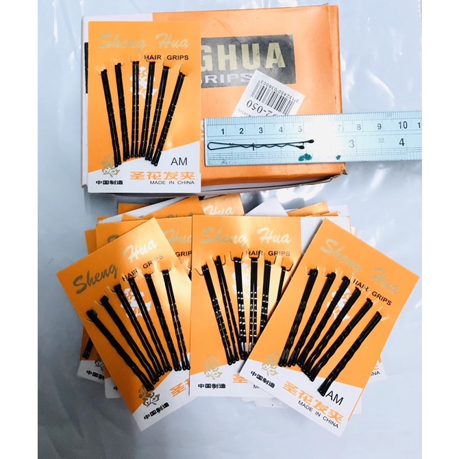 กิ๊บสีดำกล่องส้ม(1กล่องมี36แผง)1แผงมี12ชิ้น)
