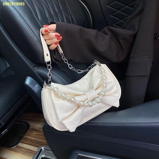 มีสินค้า✨👜Design bow bag women s 2022 new pearl กระเป๋าถือจีบไหล่ข้างเดียวกระเป๋าสตรี